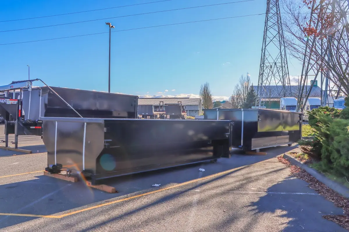 Roll-off dumpster ready for waste disposal at job site for 2 Yard Dumpster Rental in Sturgis